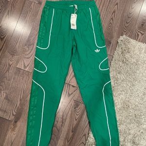 Adidas green track pants